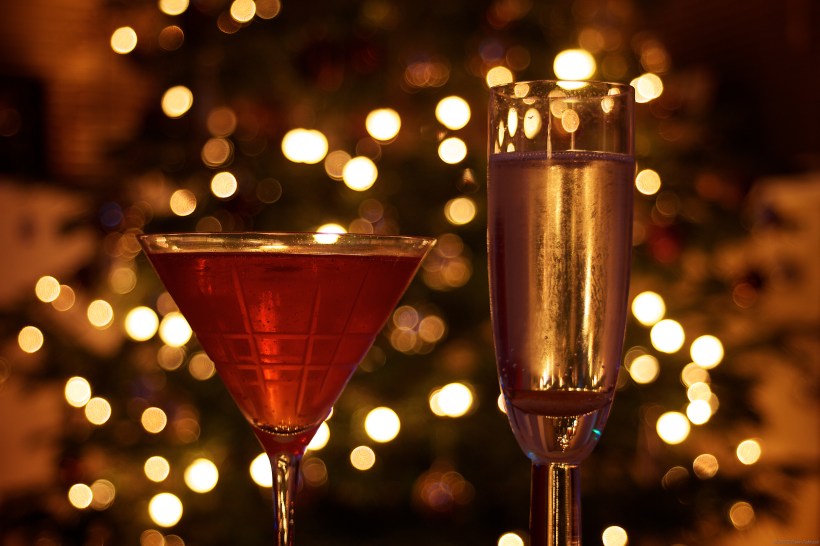 New Year drinks in front of Christmas tree